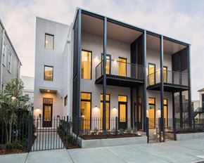 New Orleans apartment for rent - the facade of a modern apartment building with balconies