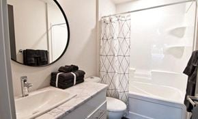 Brandon apartment for rent - a bathroom with a toilet and a sink and a shower