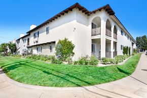 Downey apartment for rent - a white house with a yard in front of it