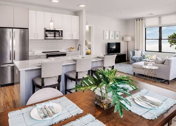 Natick apartment for rent - an open kitchen and living room with a dining table and chairs