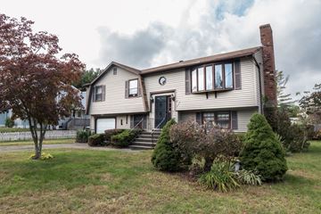 New Haven apartment for rent - the front of a house with a lawn and trees