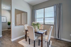 Sun Prairie apartment for rent - a dining room with a table and chairs and a window