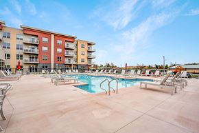 Sun Prairie apartment for rent - our apartments have a resort style pool with lounge chairs