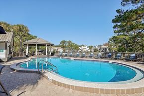 Ponte Vedra Beach apartment for rent - A small pool with a tiled edge and a gazebo in the background.