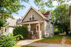 Madison apartment for rent - a house with a bike parked outside of it
