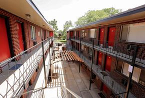 Denver apartment for rent - a view of the courtyard of an apartment building from a balcony