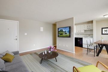 Denver apartment for rent - a living room with a couch and a table