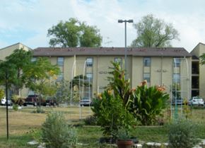 San Antonio apartment for rent - an old building with a garden in front of it