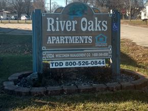 Thomson apartment for rent - a sign for river oaks apartments is shown in front of a road
