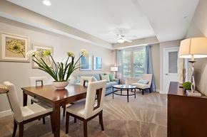 Metairie apartment for rent - A dining room with a table and chairs.