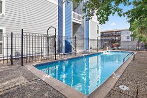 Metairie apartment for rent - our swimming pool is in front of our building and has a fence around it