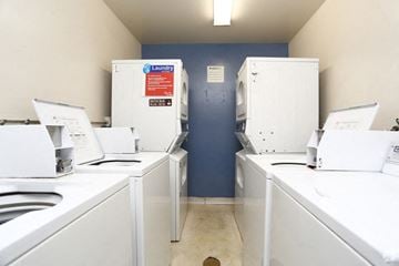 Hayward apartment for rent - A laundry room with washers and dryers.