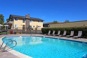 San Leandro apartment for rent - Pool with lounge chairs l Marina Plaza Apartments in San Leandro CA