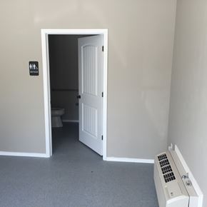 Springfield apartment for rent - A white door is open to a small bathroom.