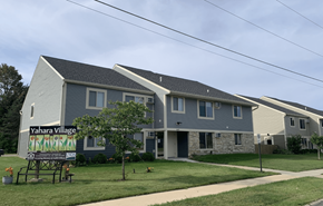 Stoughton apartment for rent - a gray house with a yard sign in front of it