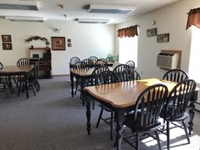 Kiel apartment for rent - A room with a long table and chairs.