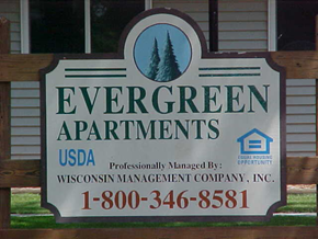 El Paso apartment for rent - a sign for evergreen apartments in front of a building
