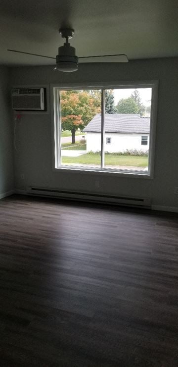 New Glarus apartment for rent - an empty living room with a large window