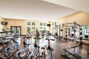 Bothell apartment for rent - a gym with exercise equipment and windows
