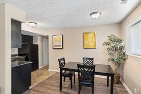 Indianapolis apartment for rent - a dining room with a table and chairs and a kitchen
