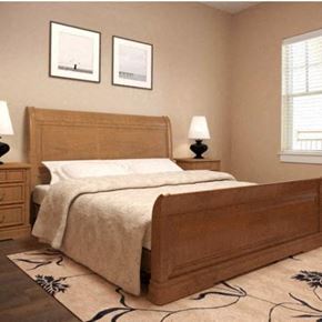 Houma apartment for rent - a bedroom with a bed and two lamps
