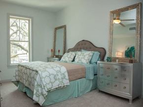 New Orleans apartment for rent - a bedroom with a bed and a dresser