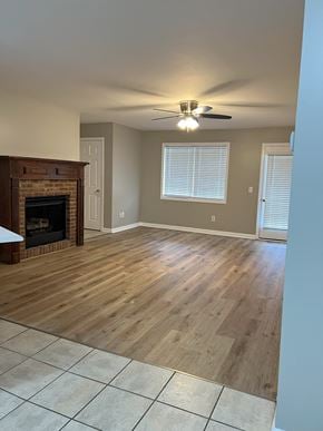 Calhoun apartment for rent - an empty living room with a fireplace and a ceiling fan