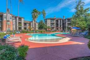 Spring apartment for rent - Apartments for Rent in Spring TX - Edgewater at Klein - Large Pool Surrounded by Lounge Seating