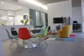 Cleveland apartment for rent - a dining room with a table and chairs and a tv