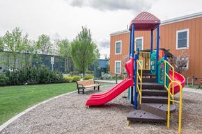 Missoula apartment for rent - a playground with a slide and a bench