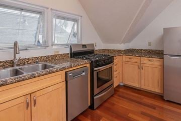 Santa Cruz apartment for rent - a kitchen with granite counter tops and stainless steel appliances