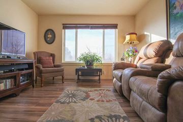 Missoula apartment for rent - a living room with a couch and a tv