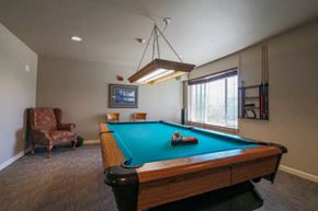 Missoula apartment for rent - a games room with a pool table and a window