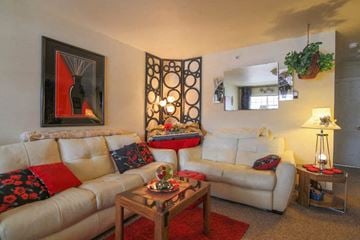 Missoula apartment for rent - a living room with two couches and a table