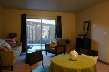 Missoula apartment for rent - a living room with a couch and a table