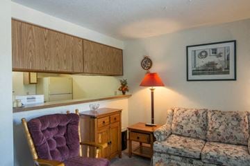 Missoula apartment for rent - a living room with a couch and a chair