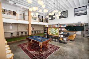 Chamblee apartment for rent - a recreation room with a pool table in the middle of it