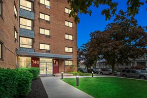 Lancaster apartment for rent - an apartment building with a sidewalk in front of it