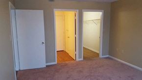 Statesboro apartment for rent - A room with a white door, a white closet door, and a white closet.