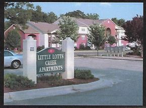 Statesboro apartment for rent - Little Lots Creek Apartments sign in front of a building.