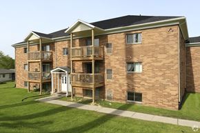 Lodi apartment for rent - an exterior view of a brick apartment building with balconies