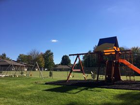 Lodi apartment for rent - a playground with a swing set on a sunny day