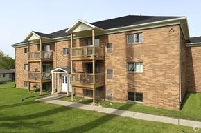 Lodi apartment for rent - an exterior view of a brick apartment building with balconies