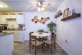 Spartanburg apartment for rent - a kitchen and dining room with a table and chairs