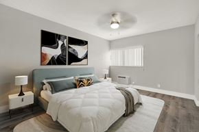 Bay Harbor Islands apartment for rent - A bedroom with a large bed and a painting on the wall.
