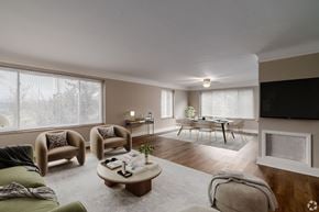 Shaker Heights apartment for rent - A living room with a couch, chairs, and a coffee table.