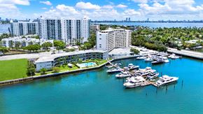 N.Bay Village apartment for rent - A marina with boats docked in front of apartment buildings.