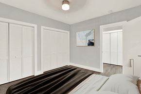 N.Bay Village apartment for rent - A bedroom with a large bed and a painting on the wall.
