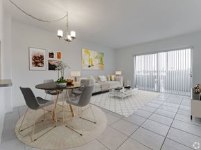 Hialeah apartment for rent - A modern dining room with a round table and chairs.