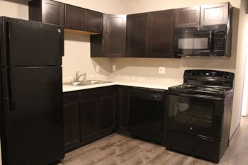Wooden cabinets and lights in kitchen